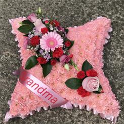 Based pink cushion with sash
