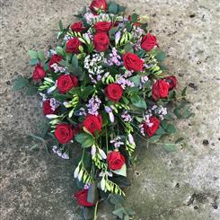 Red rose and freesia spray 